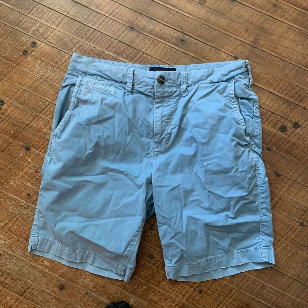 American Eagle Next level flex flat front blue 30 slim shorts